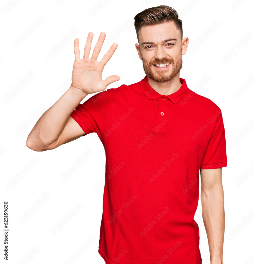 Young redhead man wearing casual clothes showing and pointing up with fingers number five while smiling confident and happy. Young redhead man wearing casual clothes showing and pointing up with fingers number five while smiling confident and happy.