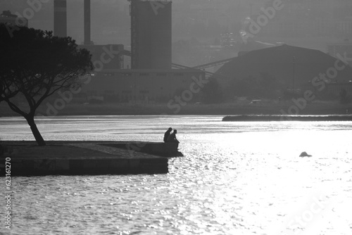 Life at sunset on Mimar Sinan Bridge photo