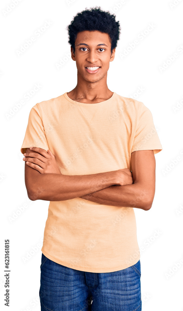 Fototapeta premium Young african american man wearing casual clothes happy face smiling with crossed arms looking at the camera. positive person.