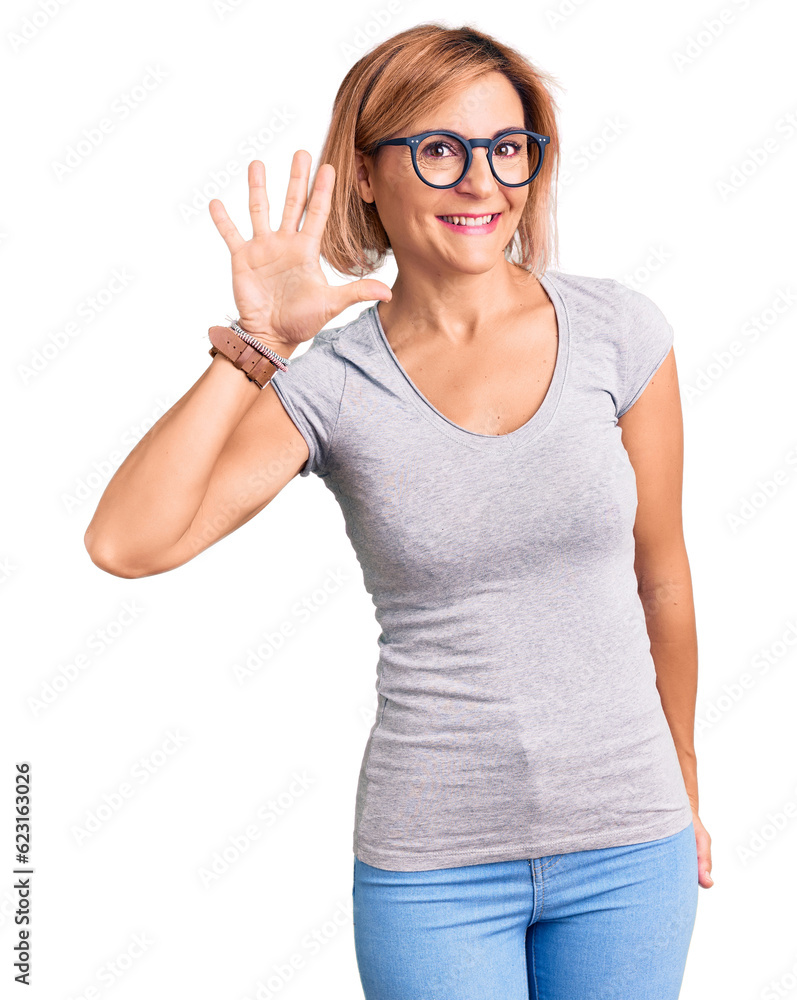 Young blonde woman wearing casual clothes showing and pointing up with fingers number five while smiling confident and happy. Young blonde woman wearing casual clothes showing and pointing up with fingers number five while smiling confident and happy.