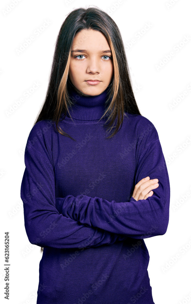 Young brunette girl with long hair wearing turtleneck sweater skeptic and nervous, disapproving expression on face with crossed arms. negative person. Young brunette girl with long hair wearing turtleneck sweater skeptic and nervous, disapproving expression on face with crossed arms. negative person.