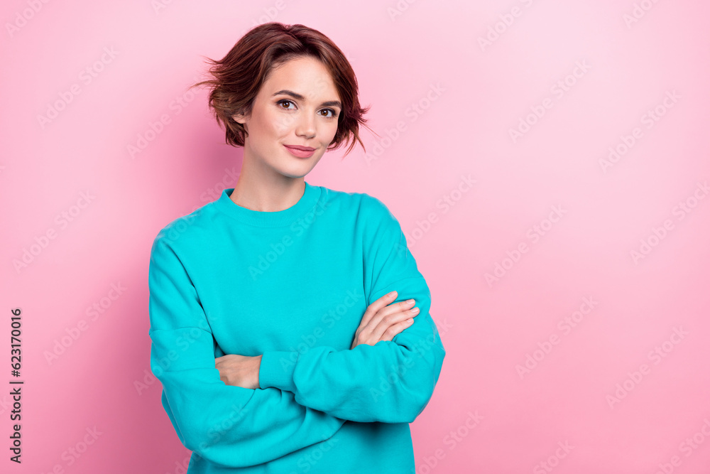 Photo of charming nice girl holding crossed arms confident wear teal oversize jumper isolated pink color background Photo of charming nice girl holding crossed arms confident wear teal oversize jumper isolated pink color background