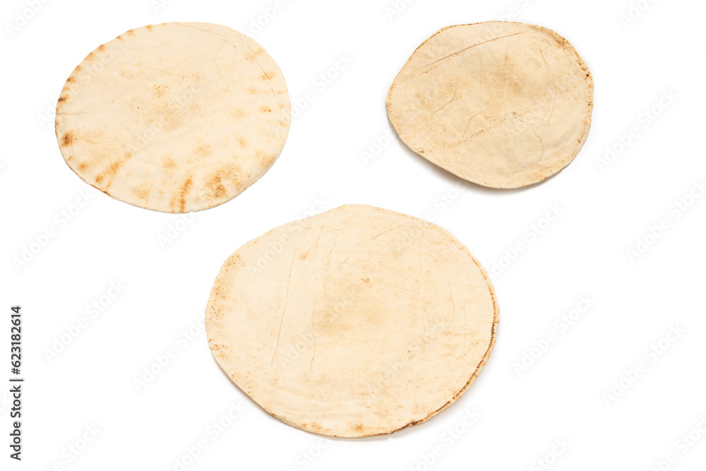 Grilled pitta bread isolated on white background. Grilled pitta bread isolated on white background.