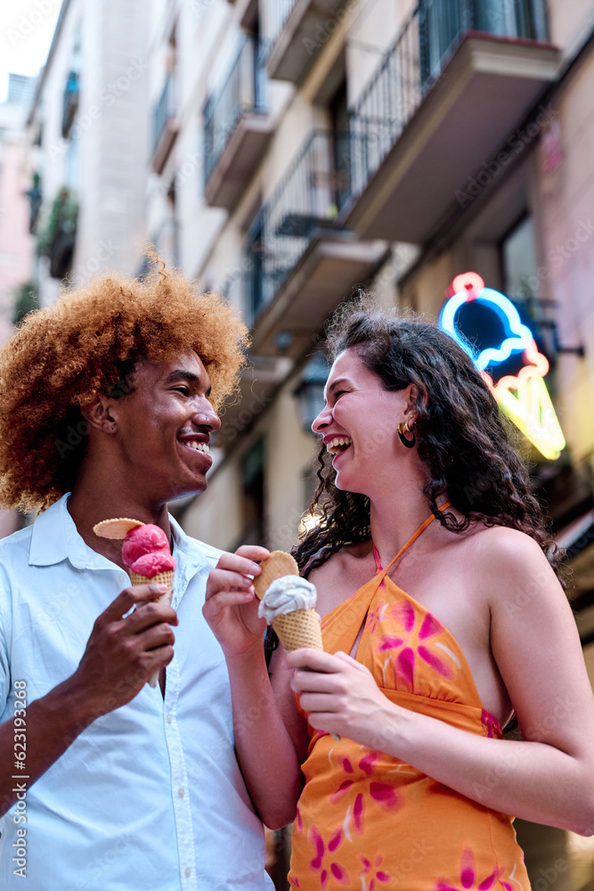 Interracial Couple Enjoying Ice Cream in the City