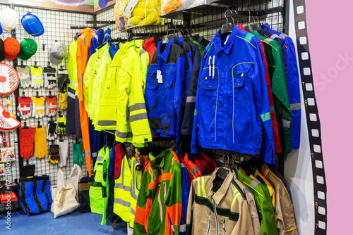 Special protective, work clothes, various jackets for builders, workers of the oil and gas industry on display in the store