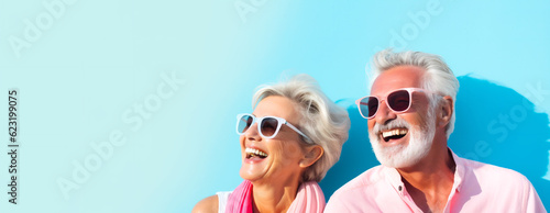 Happy Couple of mature people in sunglasses enjoying and having fun in vacations on blue background. Travel and travelers lifestyle. Close-up. Generative Ai content #623199075
