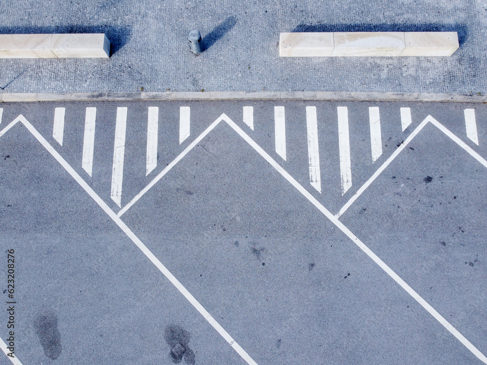 Fototapeta premium overhead drone aerial view of a parking lot