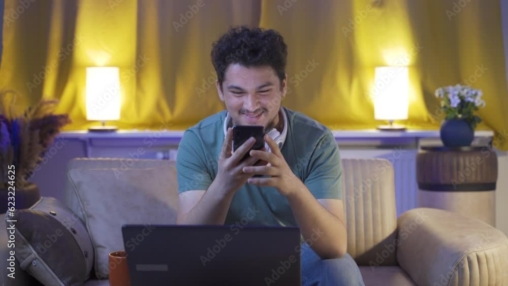 The man in love is texting on the phone. The man in love is texting on the phone.