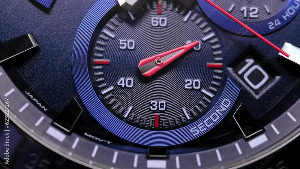 Close Up Of Stylish Luxury Man Wrist Watch With Moving Hand And Multiple Dials. Men's Swiss chronograph watch in metal with sapphire crystal. closeup view of rotating watch , running second arrow Close Up Of Stylish Luxury Man Wrist Watch With Moving Hand And Multiple Dials. Men's Swiss chronograph watch in metal with sapphire crystal. closeup view of rotating watch , running second arrow