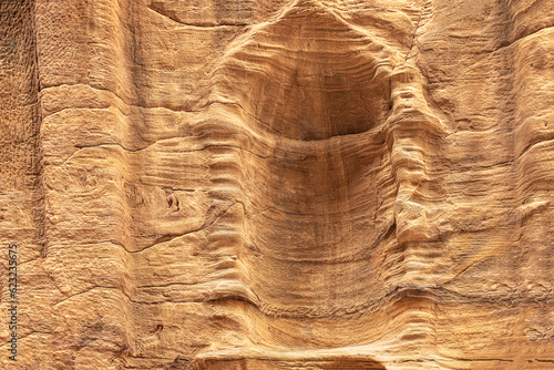 View of a wall with a man-made sandstone window. Petra, Jordan © Natallia