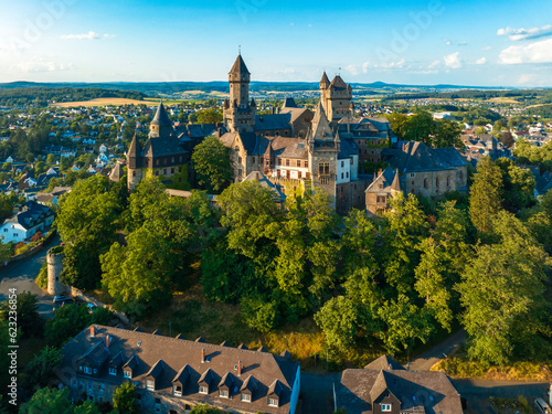 Medieval castle in Braunfels, Hesse, Germany, with many later additions. Aerial view in summer in sunset light