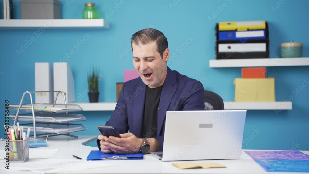 Businessman liking mobile application from phone. Businessman liking mobile application from phone.