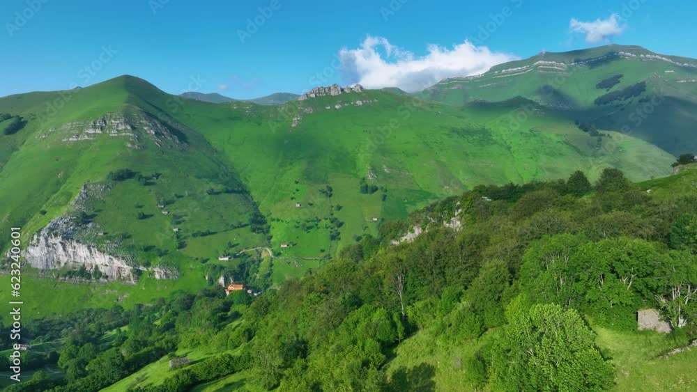 Landscape in spring in the surroundings of the village of San Roque de Riomiera. Miera river valley. Valleys Pasiegos, Cantabria, Spain, Europe Landscape in spring in the surroundings of the village of San Roque de Riomiera. Miera river valley. Valleys Pasiegos, Cantabria, Spain, Europe