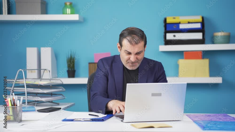 Stressed businessman using laptop. Stressed businessman using laptop.