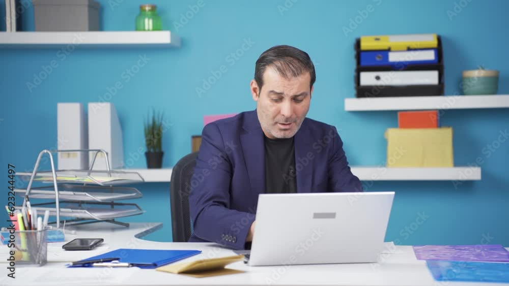 Businessman shrinking and depressed at work. Businessman shrinking and depressed at work.