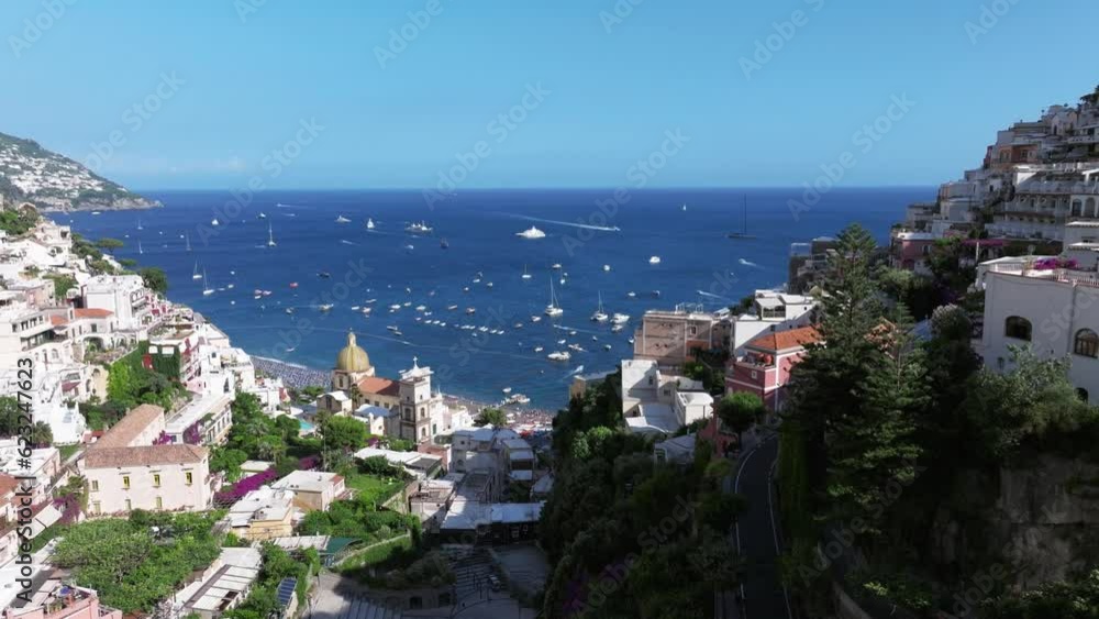 Positano, tourist destination on the Amalfi Coast, Italy. Aerial view of the famous tourist resort of the Amalfi coast. green juicy flora, Positano is a village in Naples metropolitan area. Positano, tourist destination on the Amalfi Coast, Italy. Aerial view of the famous tourist resort of the Amalfi coast. green juicy flora, Positano is a village in Naples metropolitan area.