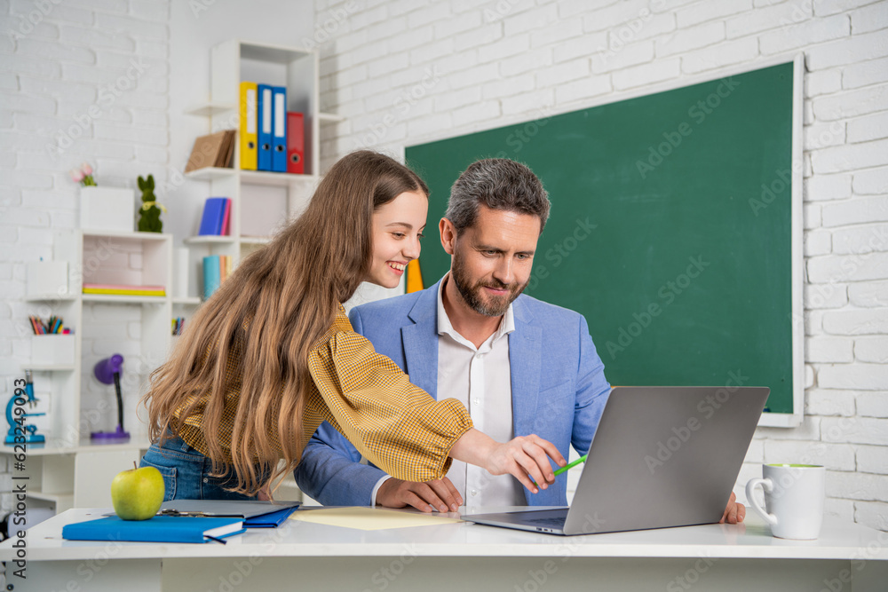 happy child with man tutor in classroom. education happy child with man tutor in classroom. education