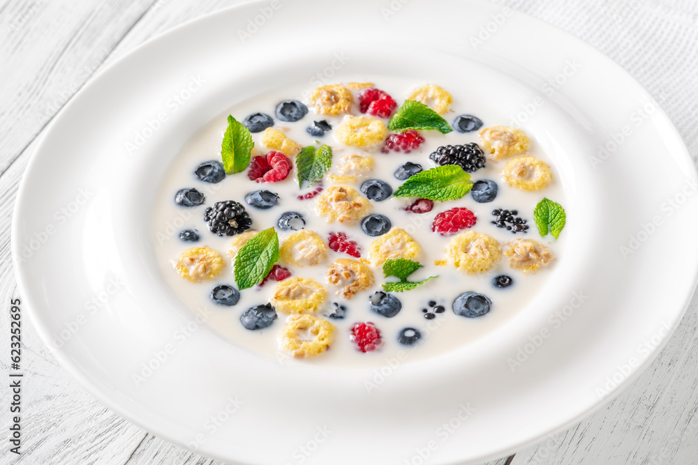 Cereal with milk and berries