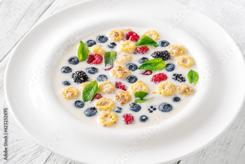 Cereal with milk and berries