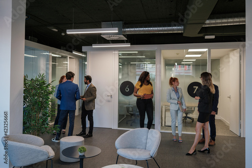 Work teams preparing the meeting in the halls of the company. Concept: business, briefing, teamwork