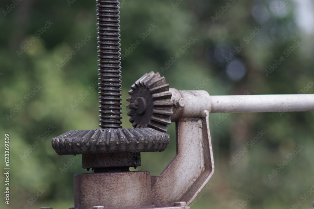 a tool to regulate the discharge of water at the sluice gates of irrigation canals a tool to regulate the discharge of water at the sluice gates of irrigation canals