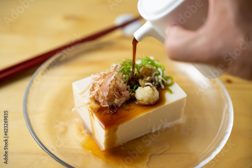 hiyayakko, japanse cold tofu with soy sauce photo