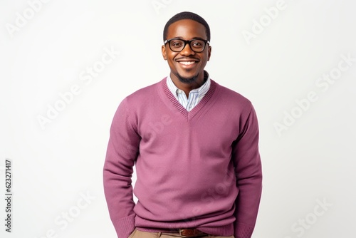 smiling african american man in eyeglasses looking at camera © Anne Schaum