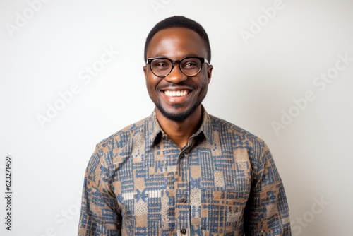 Portrait of happy african american man in eyeglasses © Anne Schaum