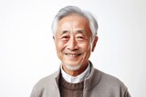 Portrait of a senior asian man smiling isolated on white background