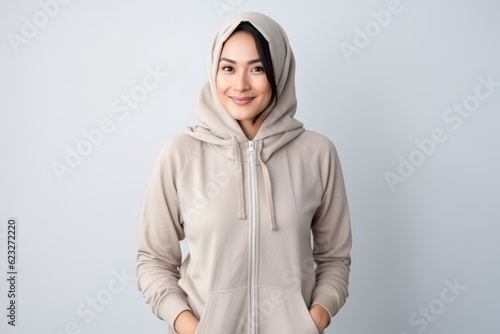 Portrait of a beautiful asian muslim woman wearing hoodie