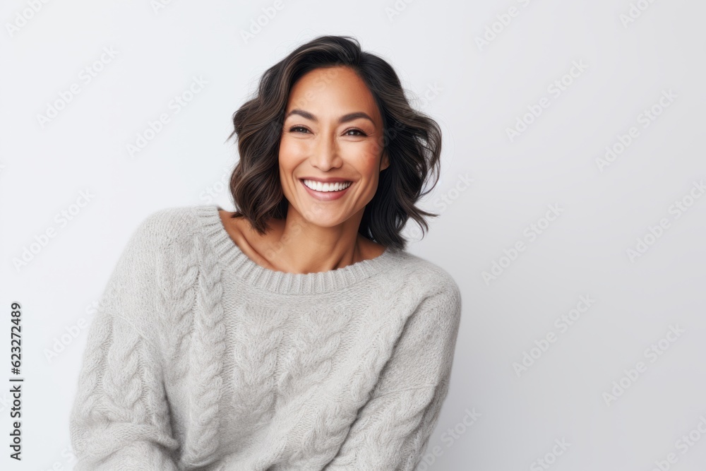 Portrait of a happy young woman smiling at camera over white background Portrait of a happy young woman smiling at camera over white background