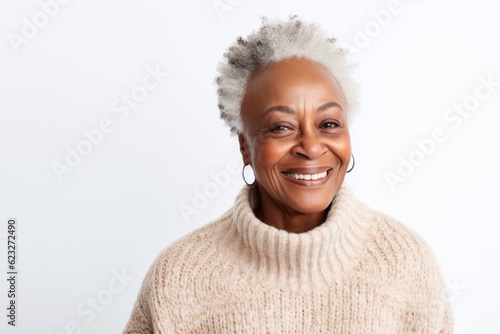 Portrait of smiling african american woman looking at camera isolated on white