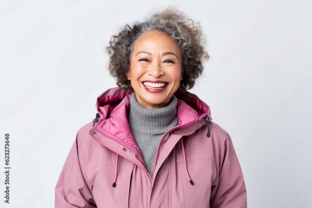 Happy african american woman in winter jacket on white background. Happy african american woman in winter jacket on white background.