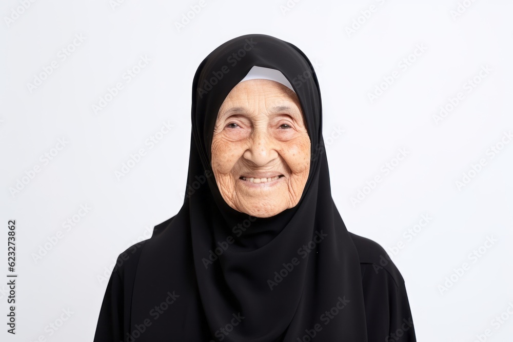 Portrait of an elderly asian muslim woman in black hijab Portrait of an elderly asian muslim woman in black hijab
