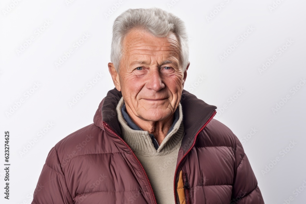 Portrait of a senior man in a warm jacket on a white background Portrait of a senior man in a warm jacket on a white background