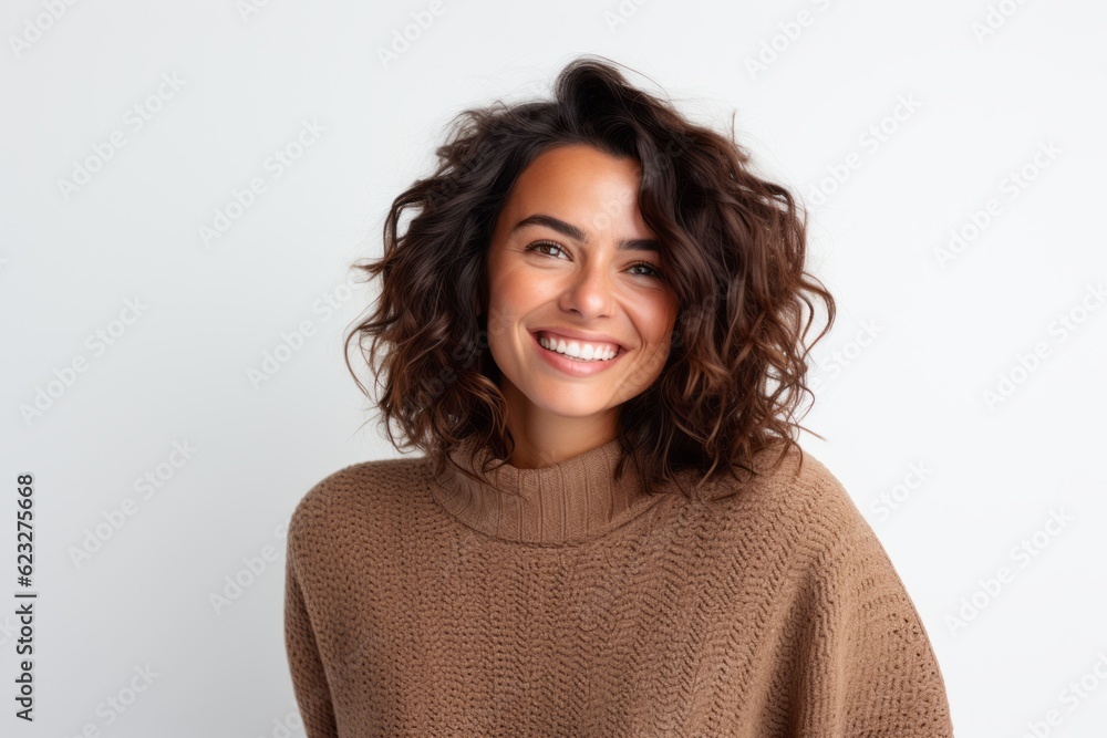 Portrait of a beautiful young woman with curly hair on a white background Portrait of a beautiful young woman with curly hair on a white background