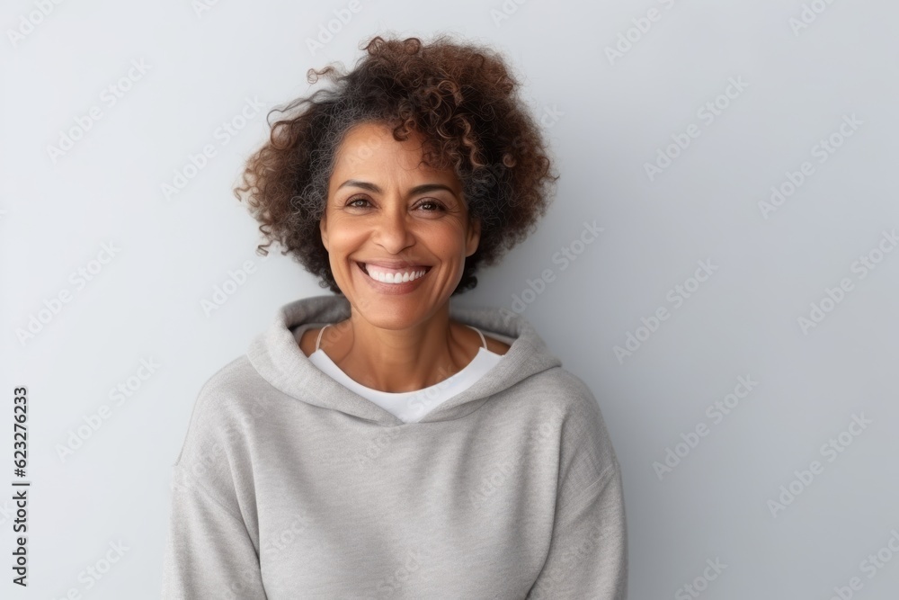 Portrait of smiling african american woman looking at camera. Portrait of smiling african american woman looking at camera.