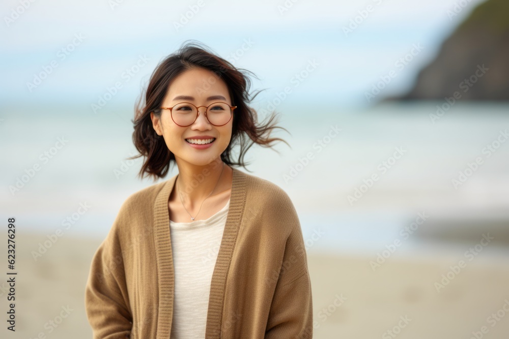 portrait of asian woman with eyeglasses on the beach portrait of asian woman with eyeglasses on the beach