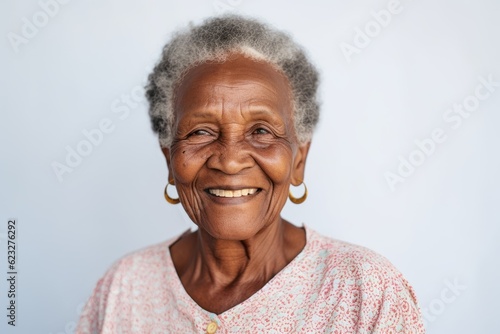 Close-up portrait photography of a pleased 100-year-old elderly Nigerian woman wearing a chic cardigan against a minimalist or empty room background 