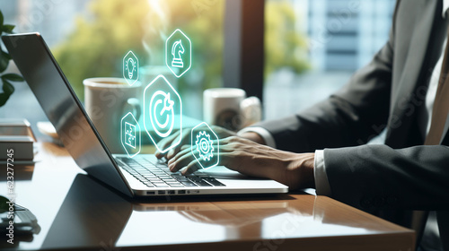 Business-man typing on a laptop with business strategy concept