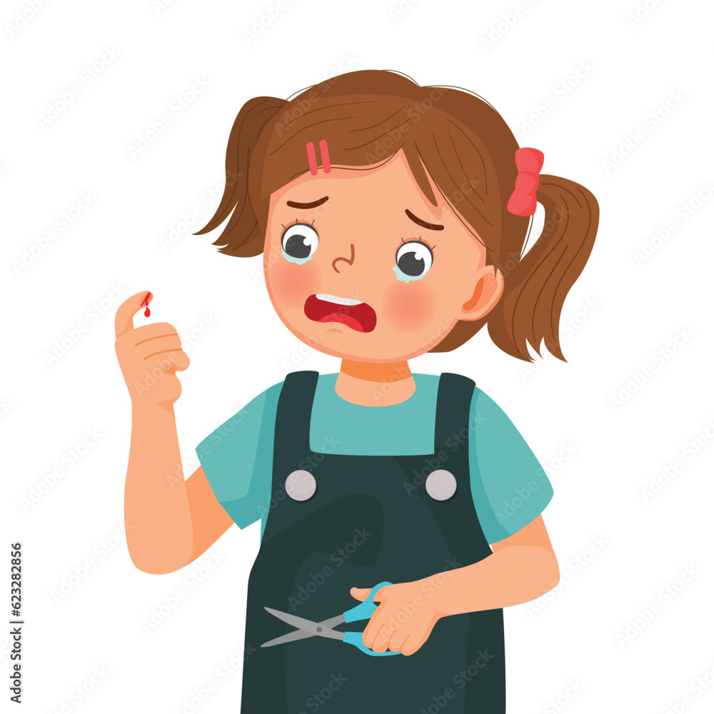 Little girl cut her finger with scissor accidentally crying look at the wound bleeding with blood drop Little girl cut her finger with scissor accidentally crying look at the wound bleeding with blood drop