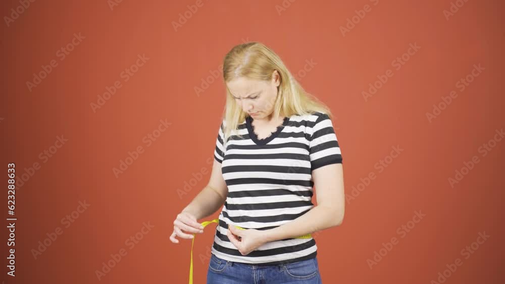 The woman who is dissatisfied with her weight. The woman who is dissatisfied with her weight.