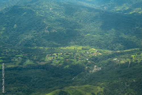 Aerial View of Mountains, Hills, Trees, Farms, Houses and Small Facilities in the Countryside in San Jose, Costa Rica