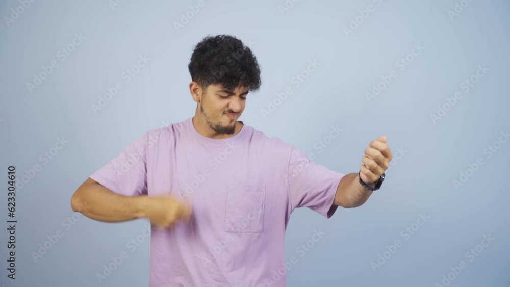 Man doing rocker sign and dancing. Man doing rocker sign and dancing.