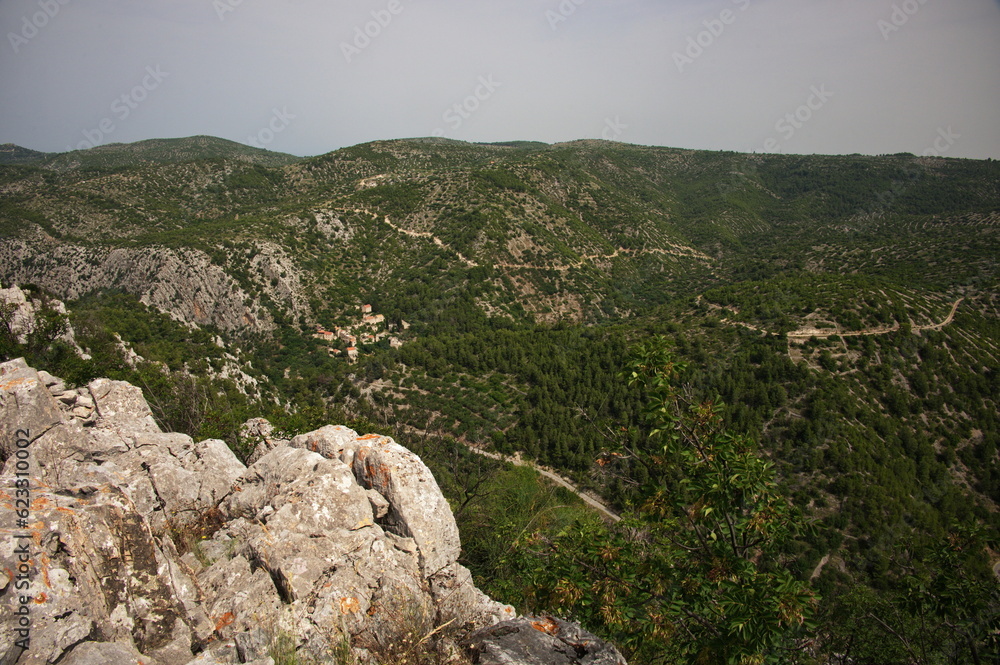 Scenic view from the mountain on remote village on Mediterranean island
