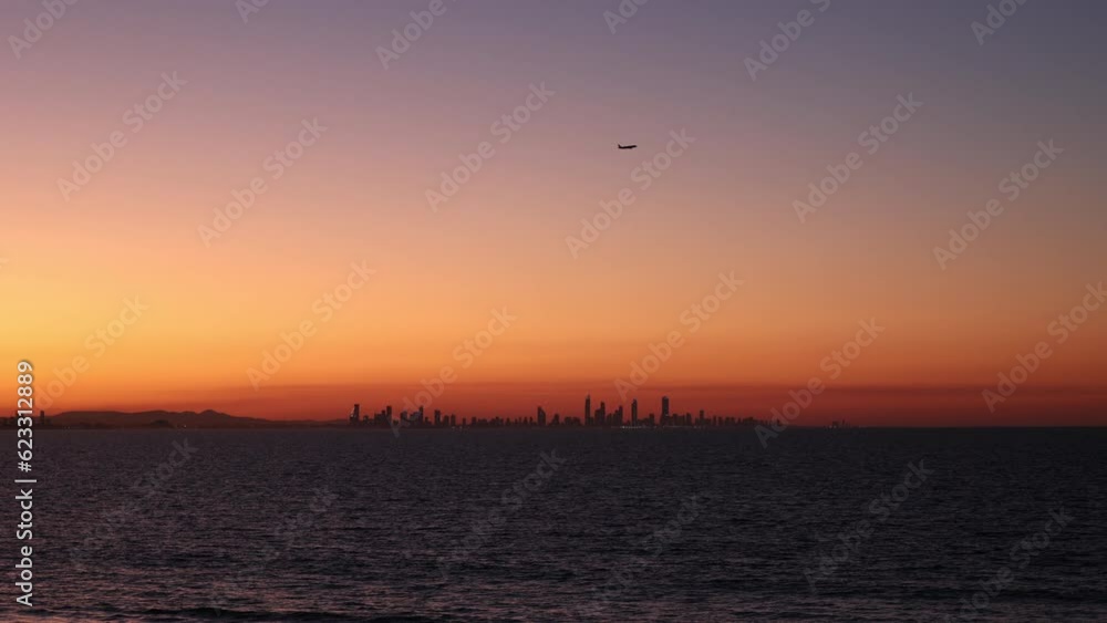 Sunset view of the Gold Coast skyline seen from Coolangatta Beach, Queensland Sunset view of the Gold Coast skyline seen from Coolangatta Beach, Queensland