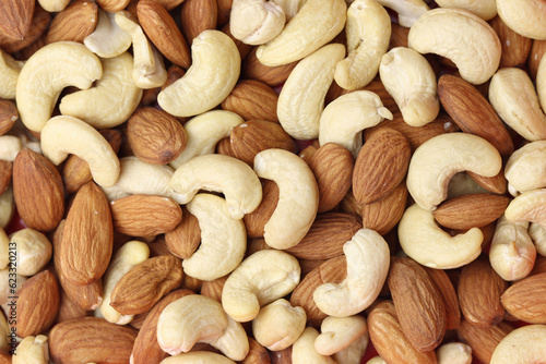 Top angle shot of Almonds and cashew nut. Close up of Almonds and cashew nut.Prunus dulcis and Anacardium occidentale photo