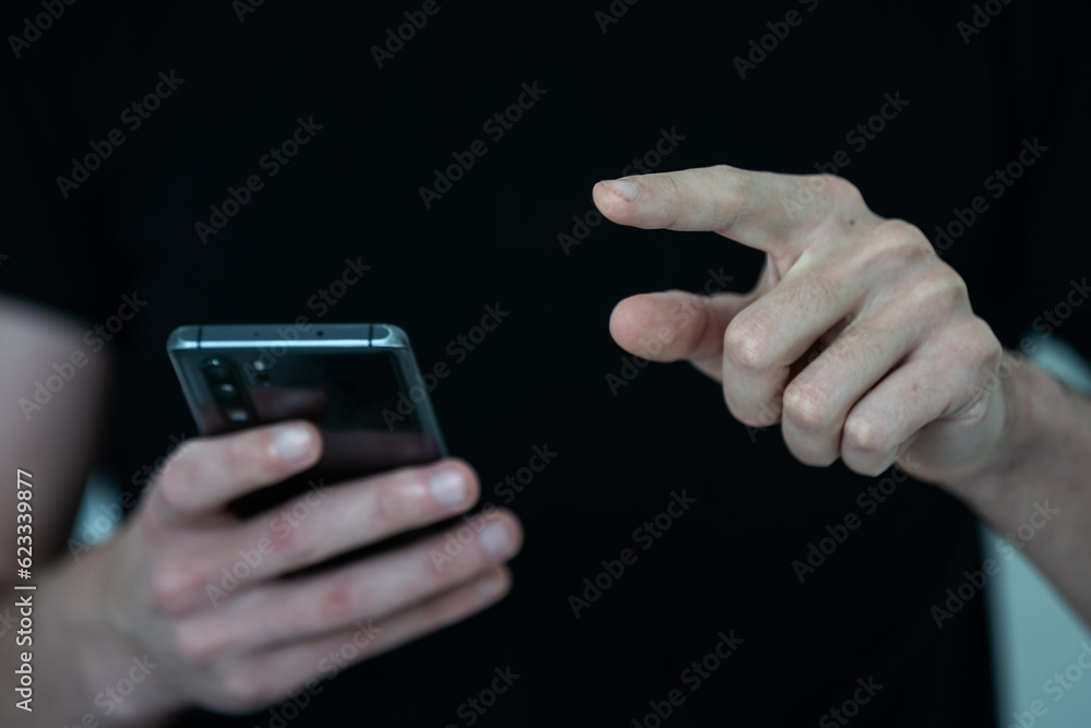 hand hold smartphone with light and shadow hand hold smartphone with light and shadow