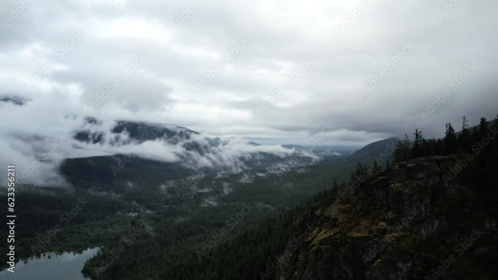 Aerial drone view from Rattlesnake ridge seattle. You can see the river, the mountains and the green pines. Majestic nature scene. Aerial drone view from Rattlesnake ridge seattle. You can see the river, the mountains and the green pines. Majestic nature scene.