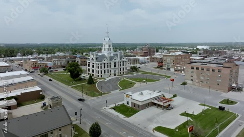 Marshall County historic courthouse in Marshalltown, Iowa with drone video moving in at an angle. photo